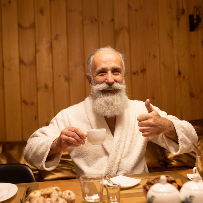 Older man looking happy in sauna
